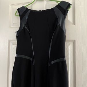 Black dress with pleather highlighting shape